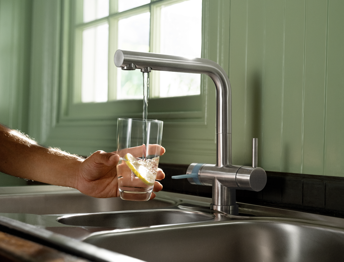 Tab water being poured into a glass